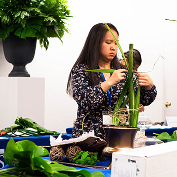 Female arranging greens