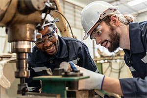 Male works at machinery