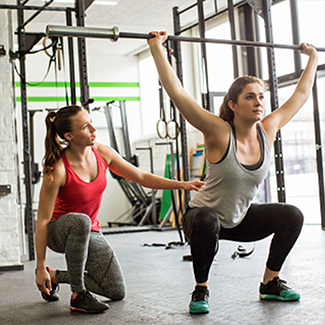 Female trainer with client