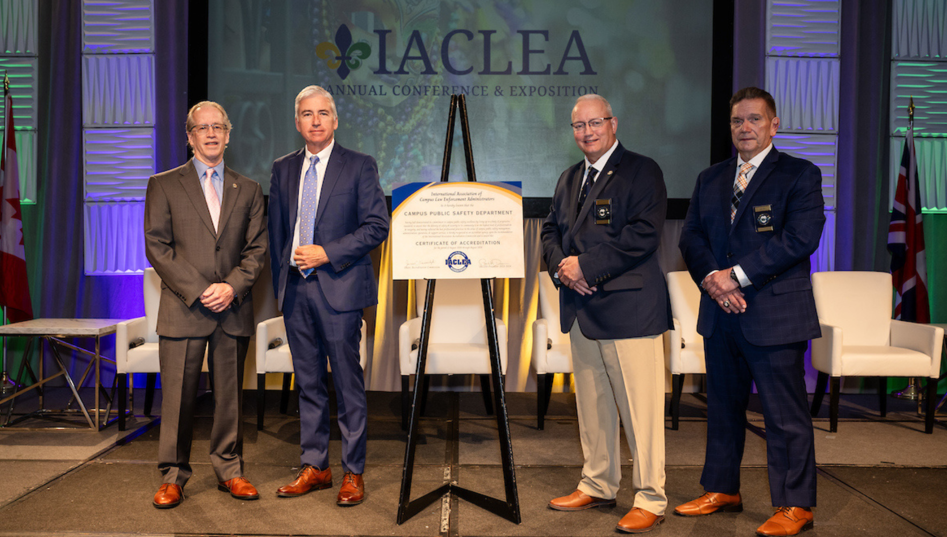 Security & Safety Executive Director Dennis McCauley, Bucks County Community College accepts the International Association of Campus Law Enforcement Administrators (IACLEA) Certificate of Accreditation from IACLEA President Paul Dean and IACLEA Executive Director Paul Cell