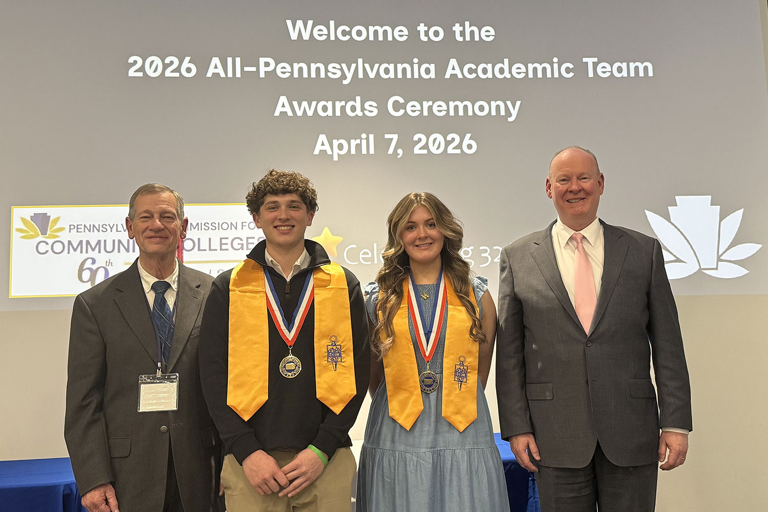 PTK faculty advisor Dr. Charles Beem, students Noah Morris and Hanna McMenamin, and BCCC President & CEO Dr. Patrick M. Jones.