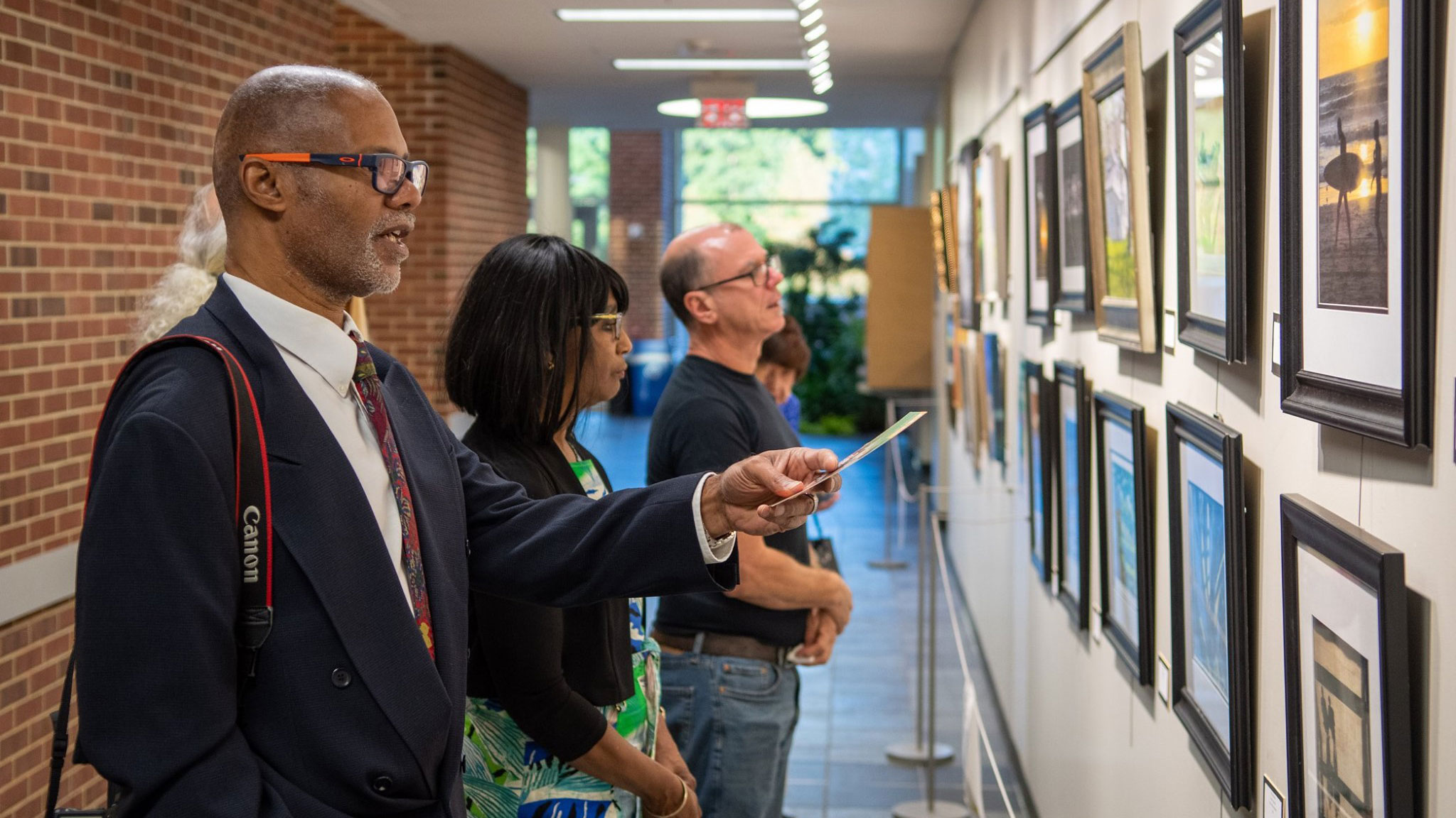 People looking at artwork