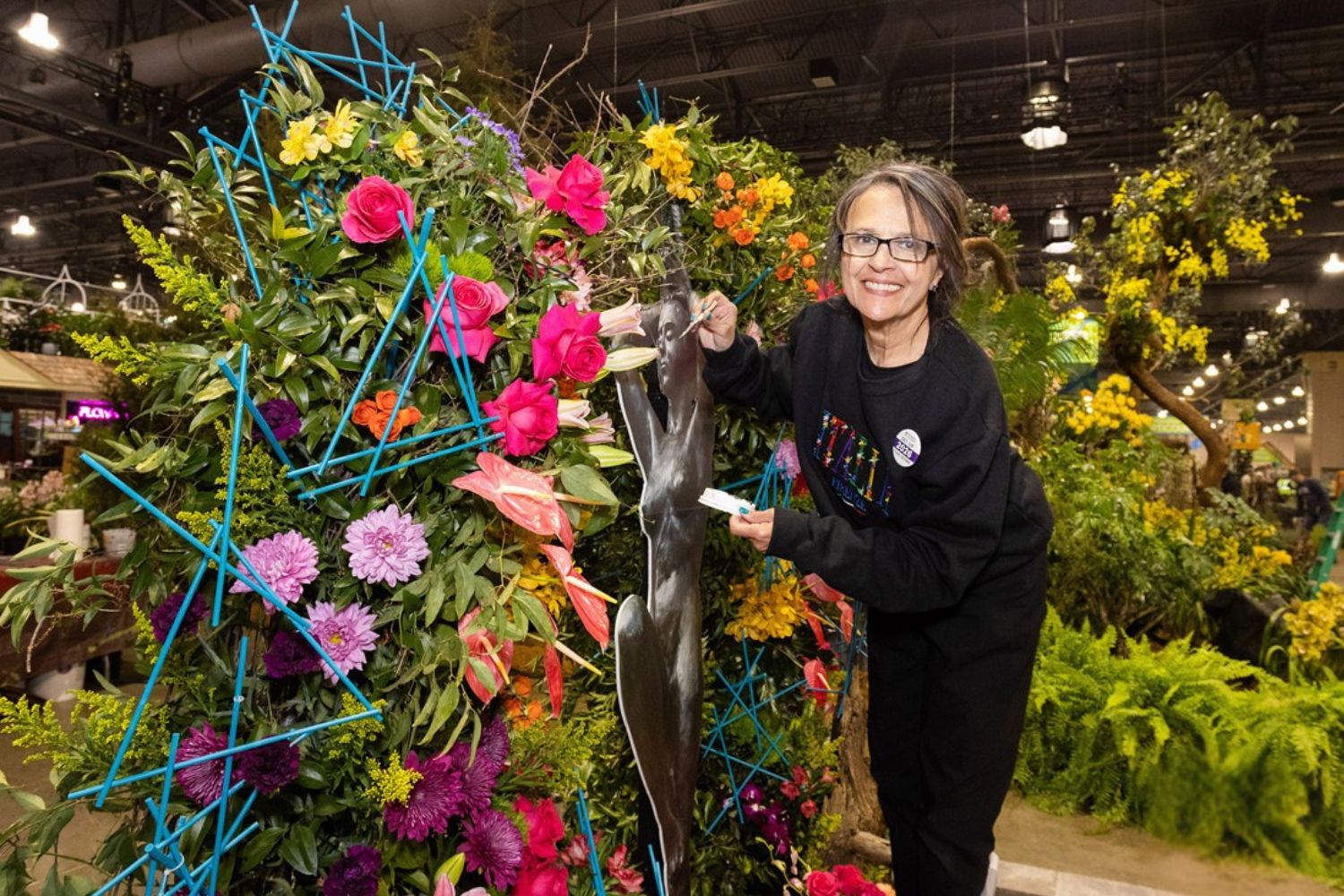 Floral designer creating exhibit at Philadelphia Flower Show